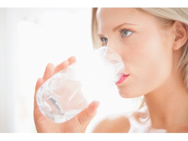 Woman with water glass